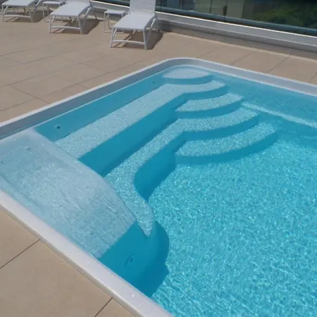 Sleek Modern With A Rooftop Pool Apartment Bibione