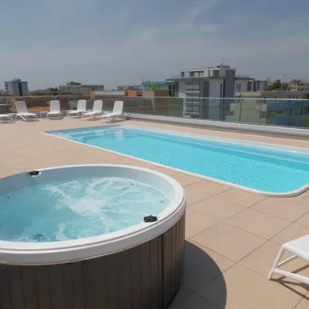 Sleek Modern With A Rooftop Pool Apartment Bibione